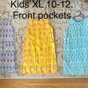 Colorful Three Islands shifts. Girls XL fits 10-12. Front pockets . $20 each